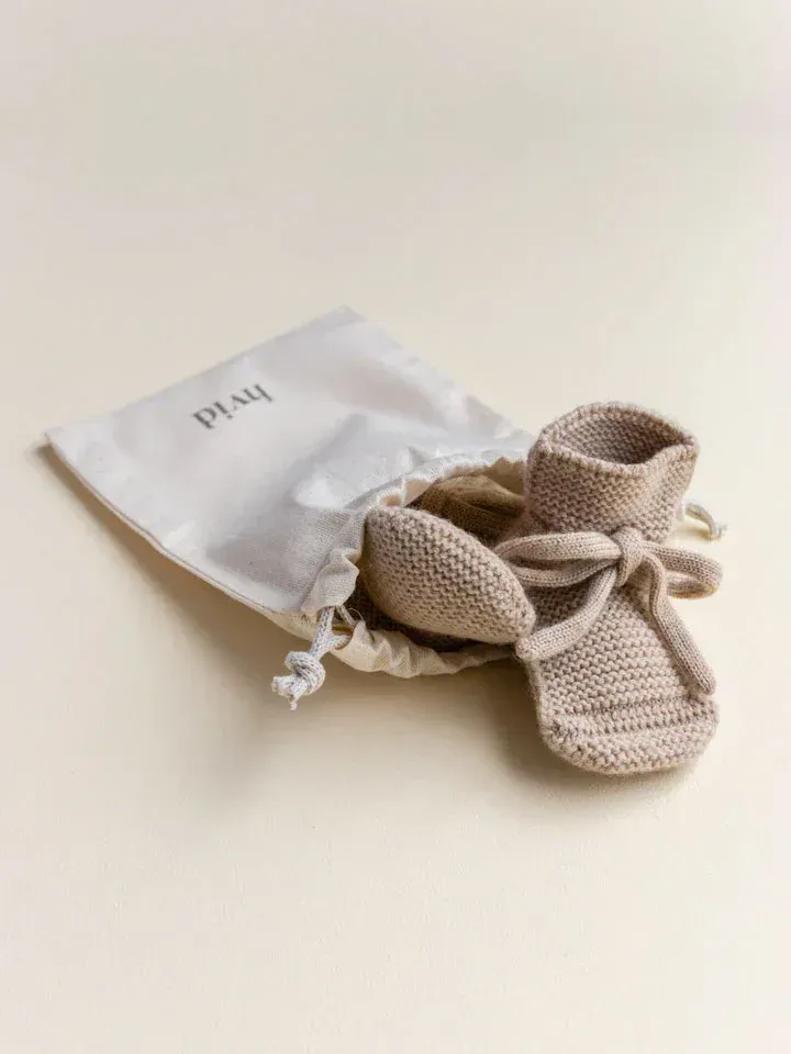 Futter i merino uld fra Hvid Knitware - Sand