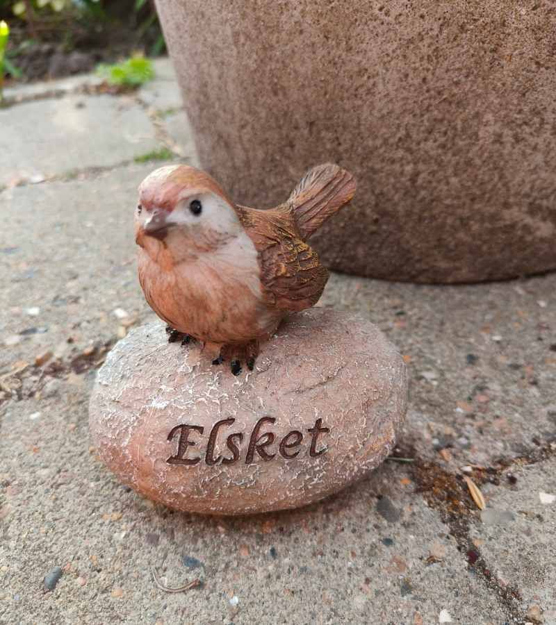 gravpynt, sten med fugl, elsket
