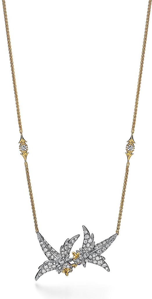 in platinum and gold with diamonds